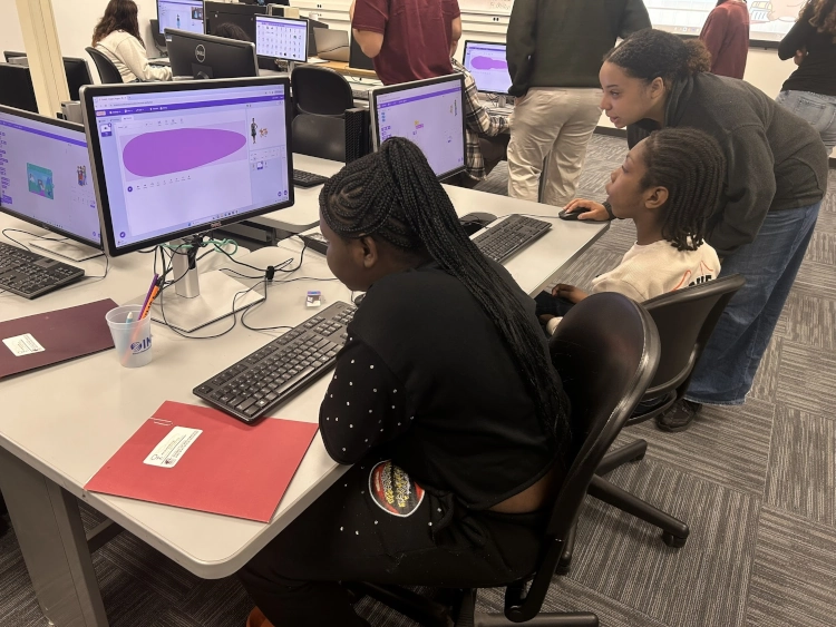 student looking at computer