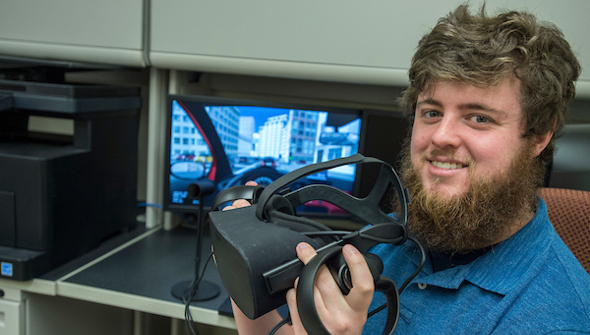 student with VR equipment